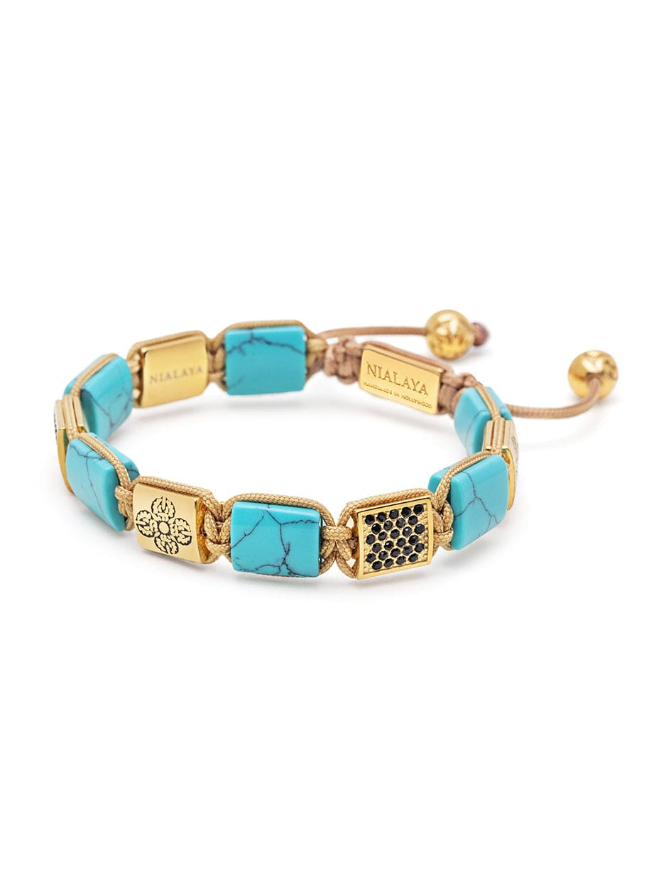 Women's Turquoise Flatbead Bracelet with Gold Dorje and Black CZ Diamonds