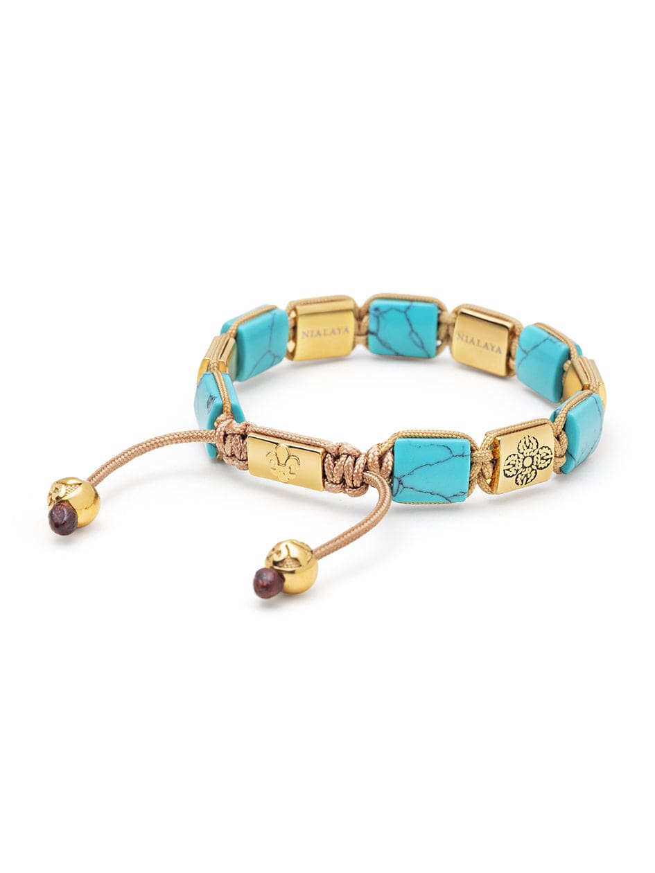 Women's Turquoise Flatbead Bracelet with Gold Dorje and Black CZ Diamonds