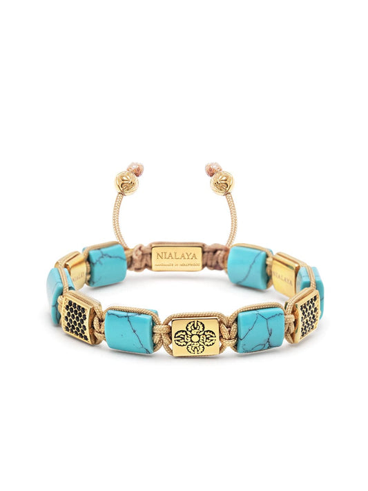 Women's Turquoise Flatbead Bracelet with Gold Dorje and Black CZ Diamonds