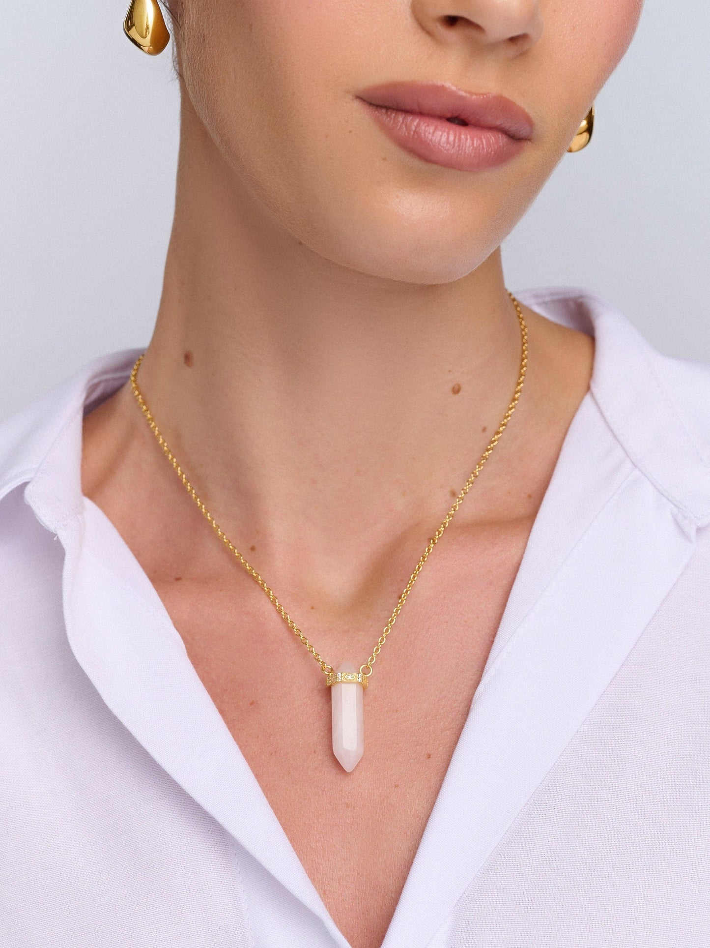 Sterling Silver Rose Quartz Crystal Necklace with Engraved Evil Eye Detail